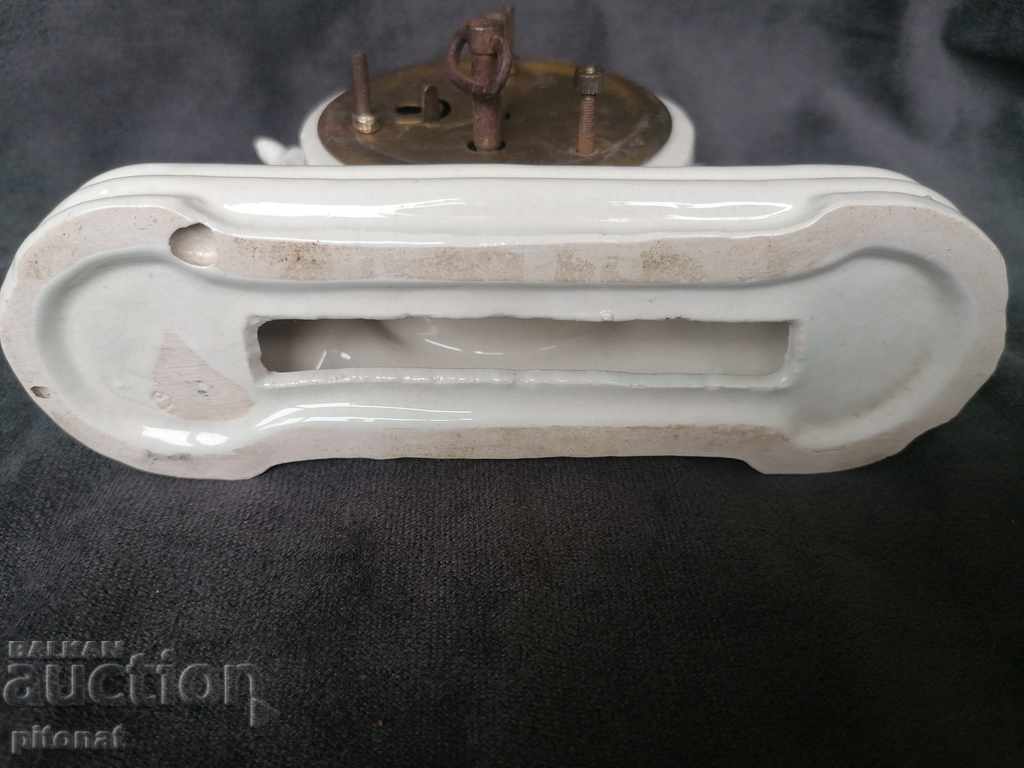 Delivery of An antique porcelain desk clock Delivery of An antique porcelain desk clock