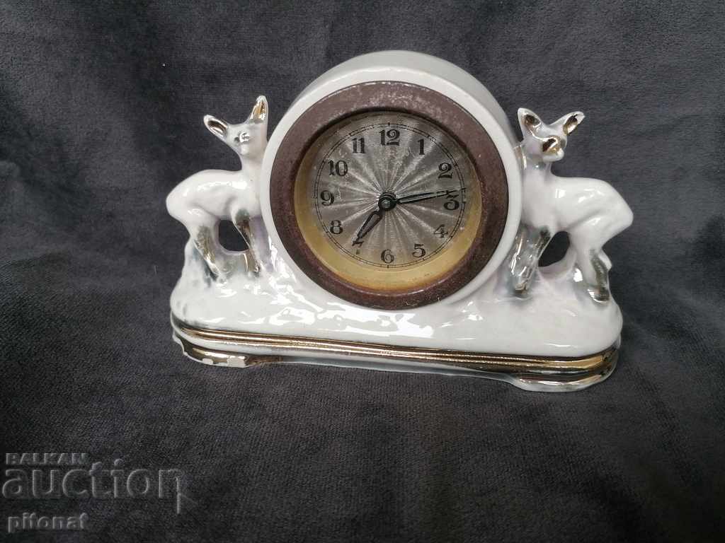 An antique porcelain desk clock
