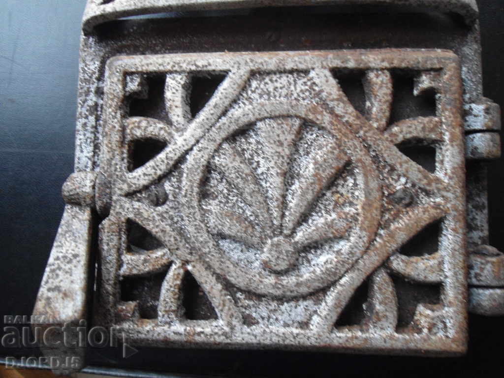 Auction  Applique and stove door from royal times