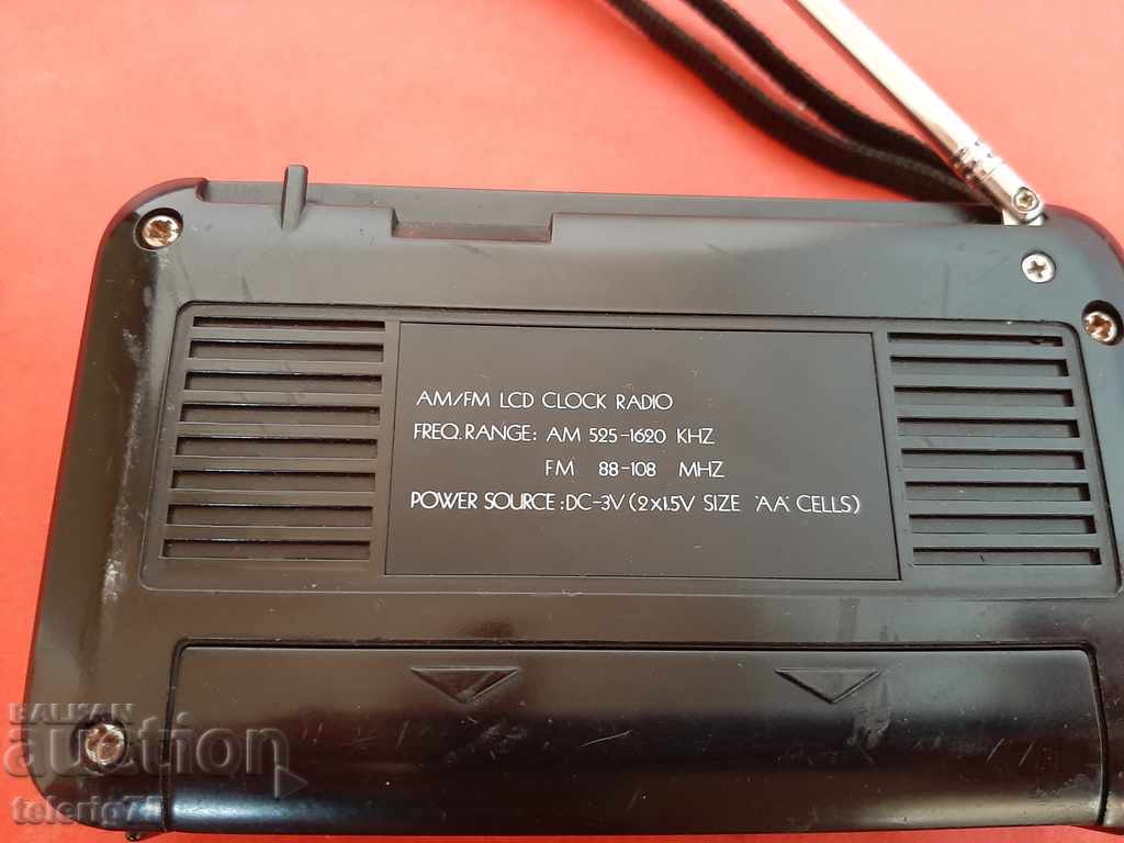 Auction FM / VHF Clock Radio Auction FM / VHF Clock Radio