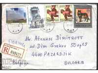 Traveled envelope with stamps Church 1996 Zodiac 1996 Wolf from Poland