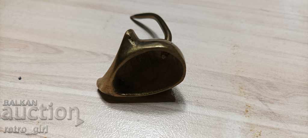 Auction  I am selling an old candle extinguisher.