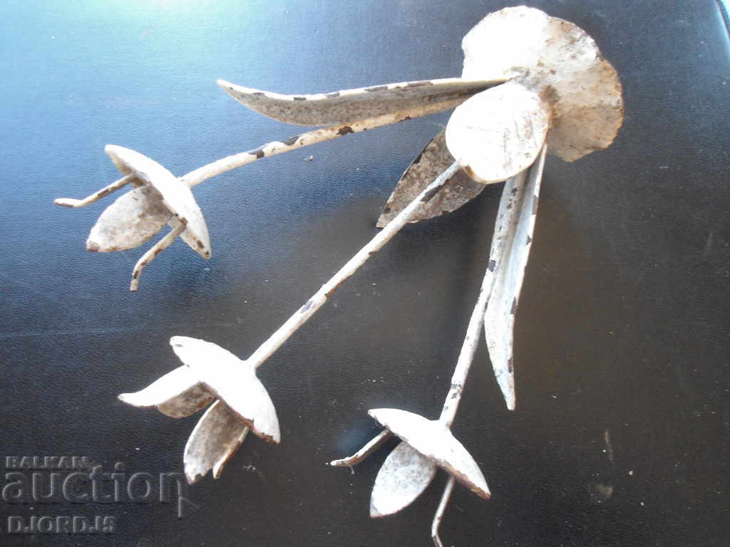 An old forged candlestick with price 4.00 BGN | € 2.05