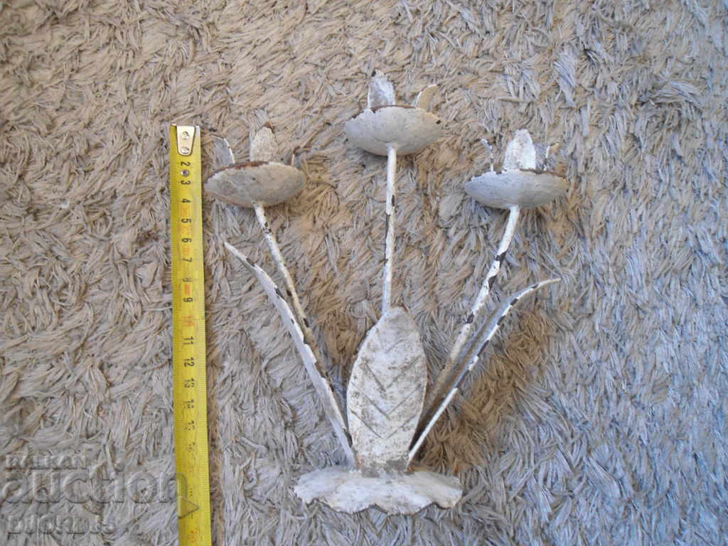 Delivery of An old forged candlestick