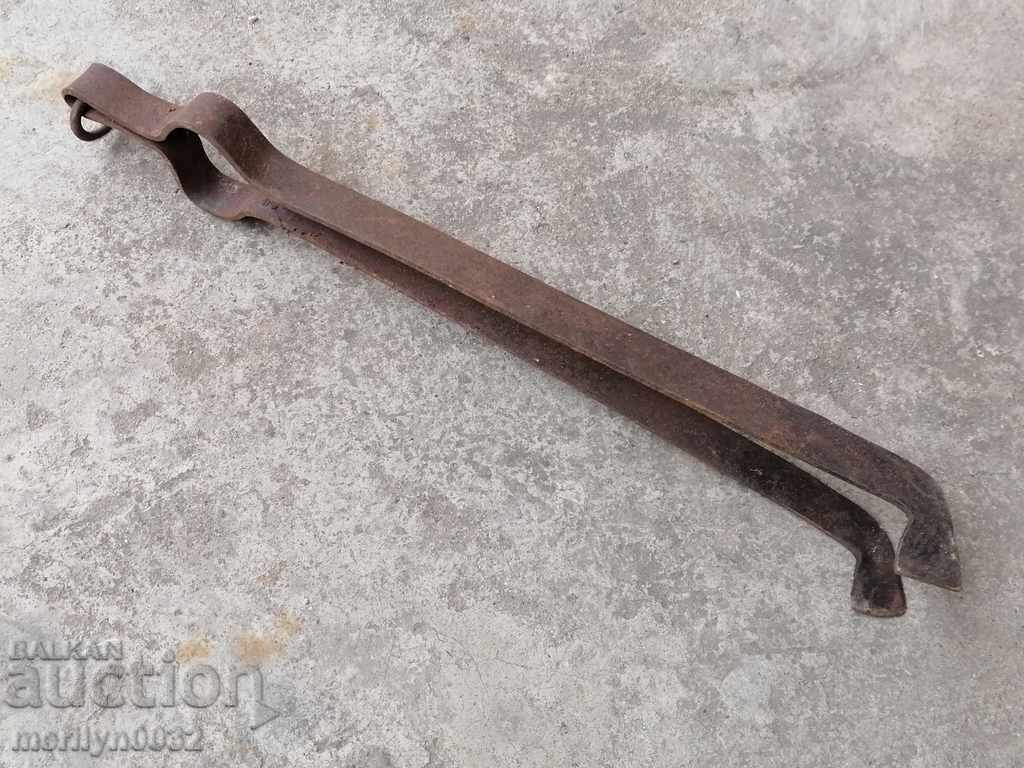 Auction  Old tongs, dilaf, wrought iron