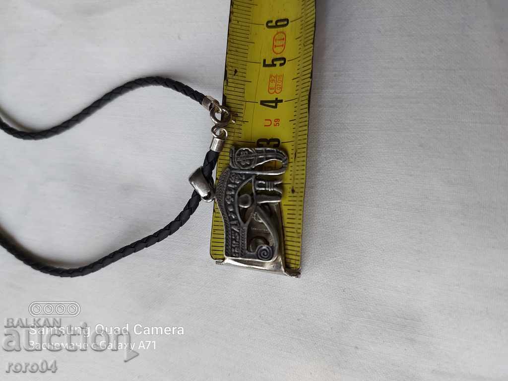 Auction SILVER PENDANT WITH LEATHER CARRIER Auction SILVER PENDANT WITH LEATHER CARRIER