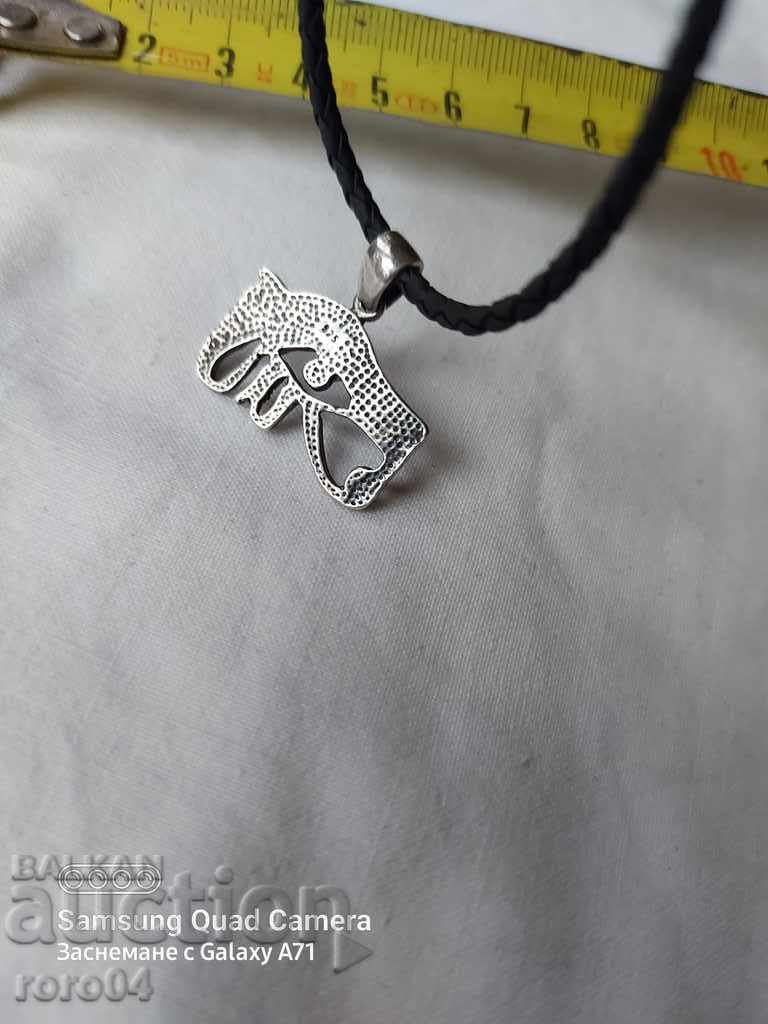 SILVER PENDANT WITH LEATHER CARRIER - 6 SILVER PENDANT WITH LEATHER CARRIER - 6