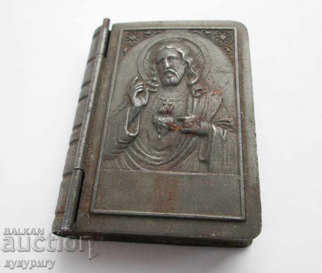 Old small religious storage box with Jesus Christ