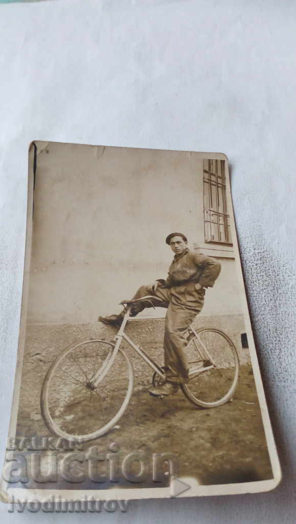 Photo Man with a retro wheel