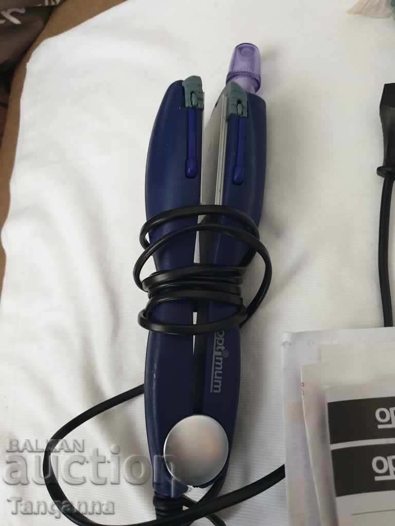 Hair straightener with various attachments