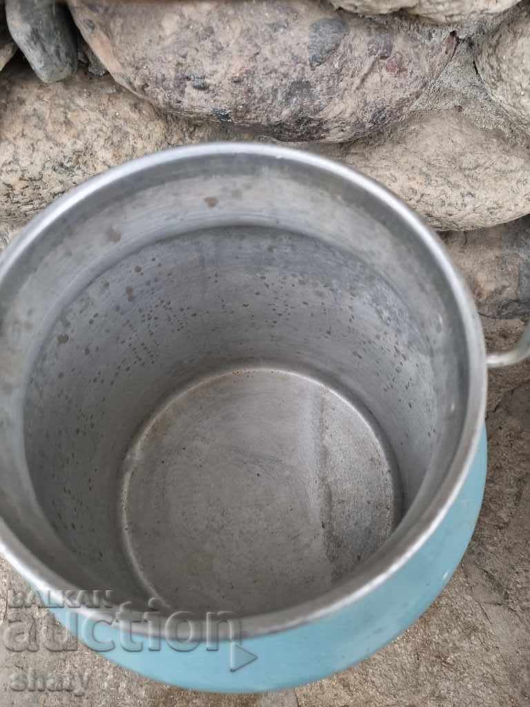 Delivery of Old aluminum milk container. Delivery of Old aluminum milk container.