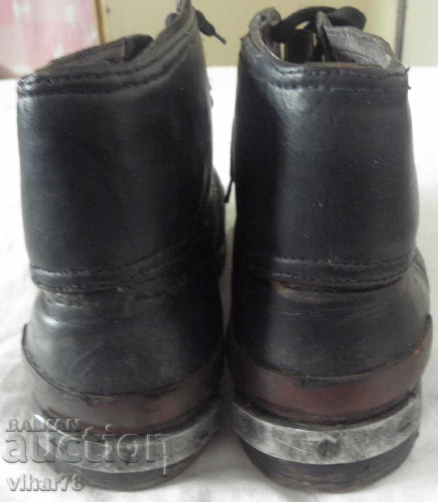 Delivery of Old military boots with straps Delivery of Old military boots with straps