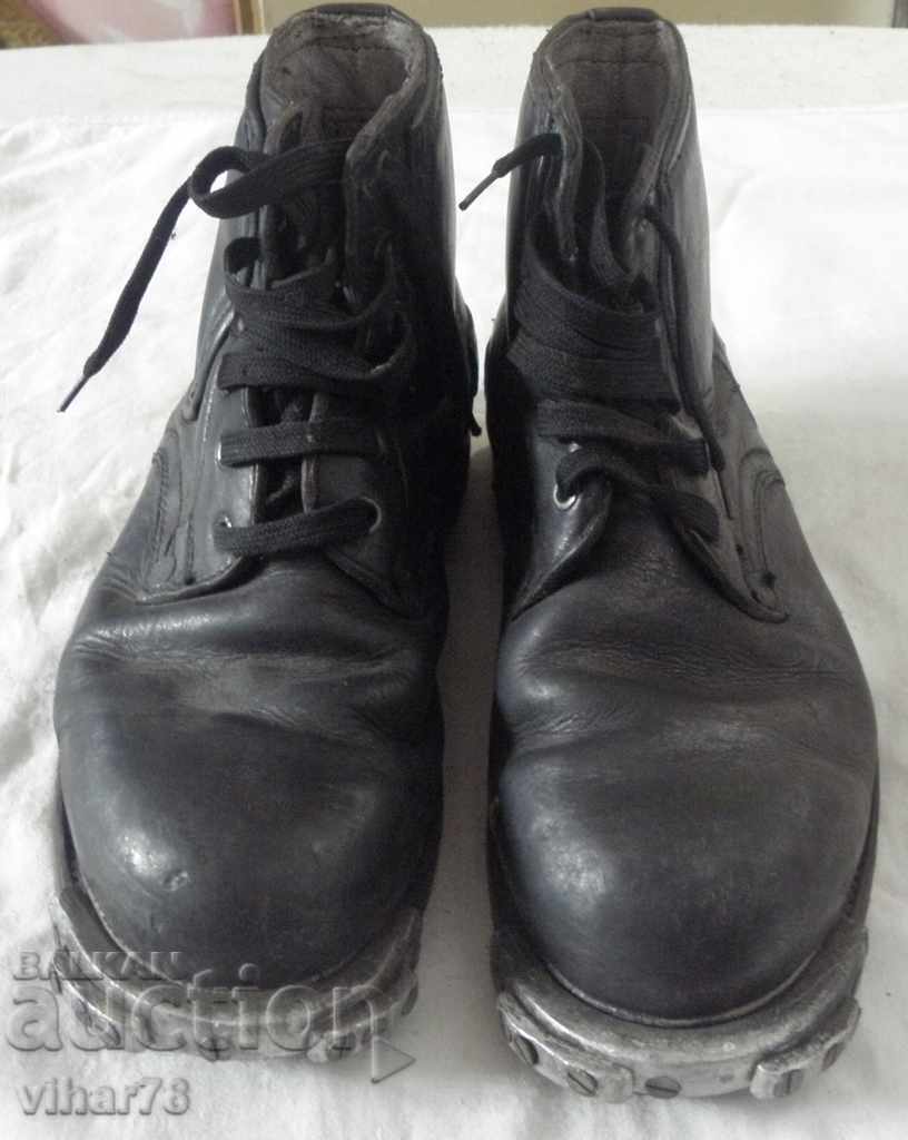 Old military boots with straps