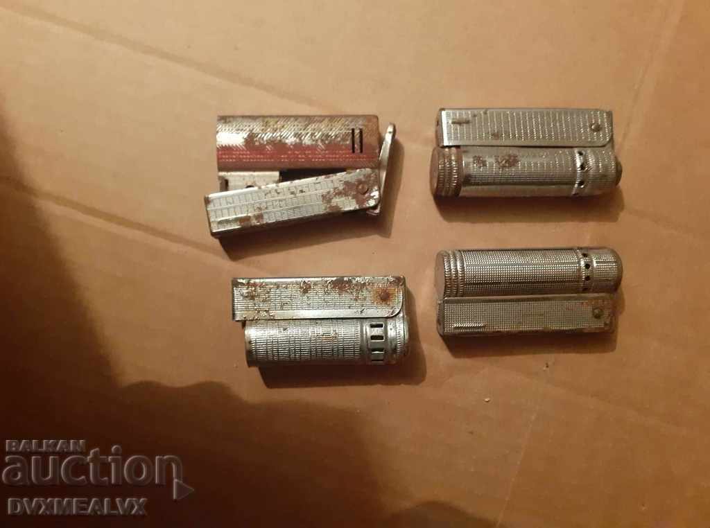 Auction Lot of 4 old petrol lighters Auction Lot of 4 old petrol lighters