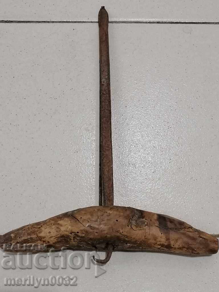 Auction Ancient crutch, burgundy, screwdriver, wrought iron Auction Ancient crutch, burgundy, screwdriver, wrought iron