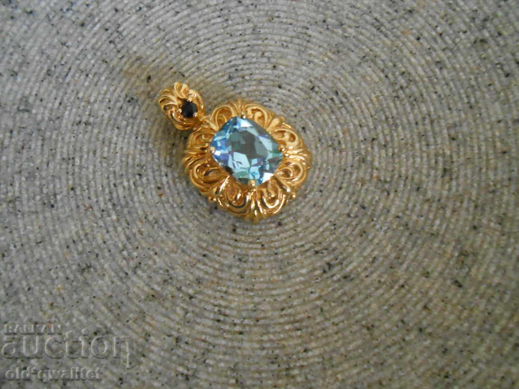Delivery of Medallion with first-class Topaz, Sapphire, Silver 925 gilding