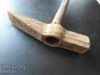 Old specialized hammer, iron handle