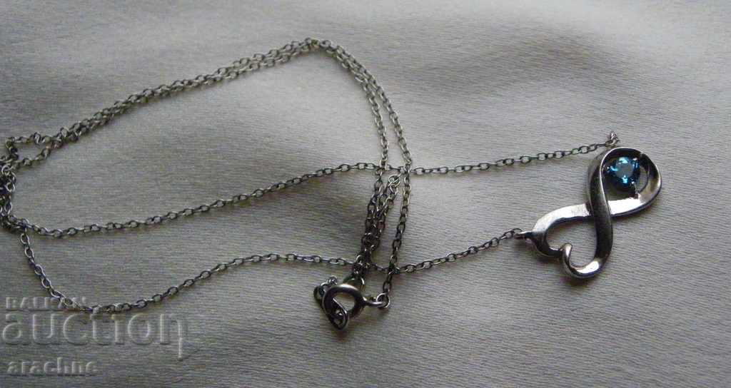 Auction  American silver necklace with "Yoga sapphire"