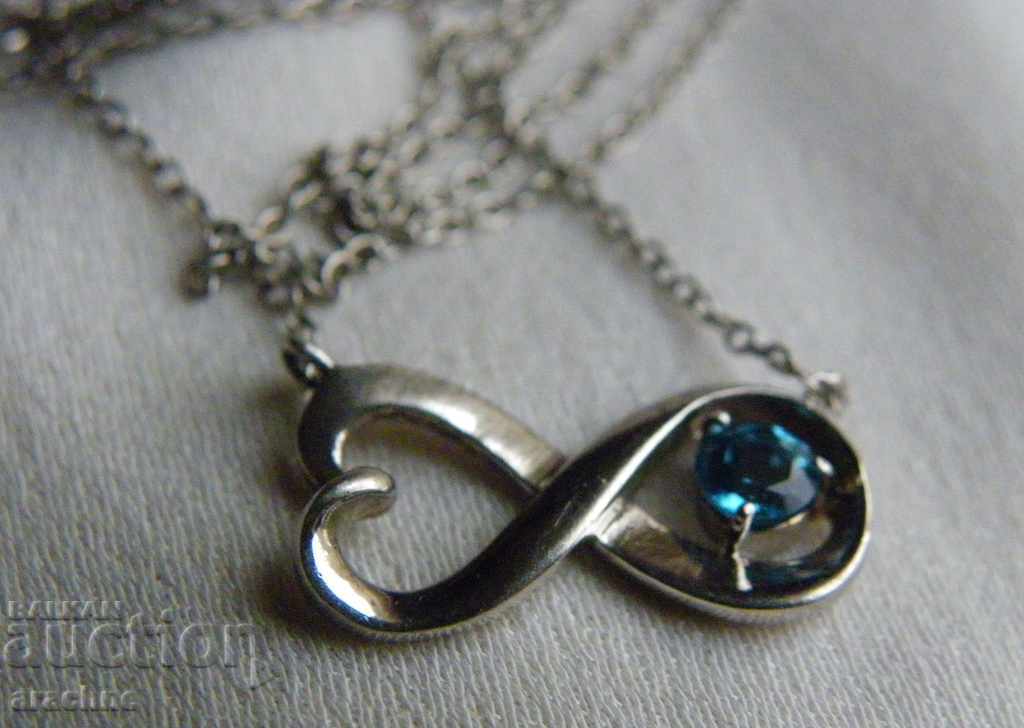 Delivery of American silver necklace with "Yoga sapphire"