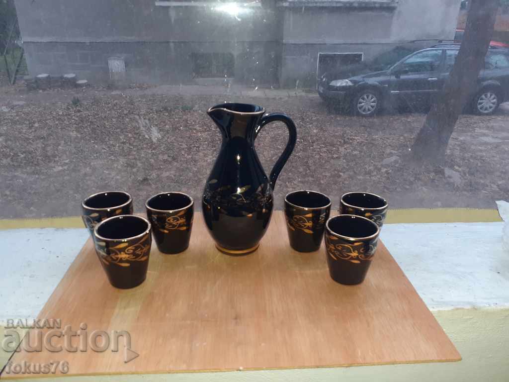Auction Service for heated brandy glazed Trojan ceramics gilt Auction Service for heated brandy glazed Trojan ceramics gilt