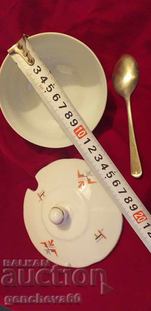 Delivery of Fine porcelain sugar bowl and silver spoon