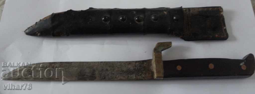 Auction  Old knife with wooden handle