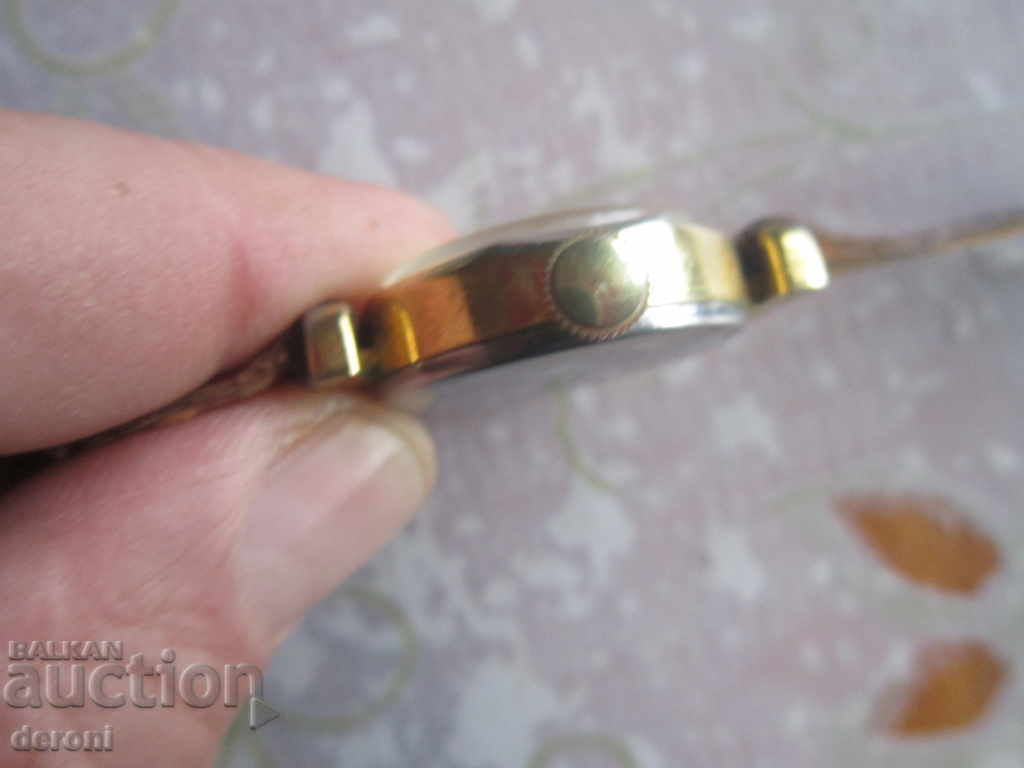 Delivery of Amazing gold watch Selecta de Luxe