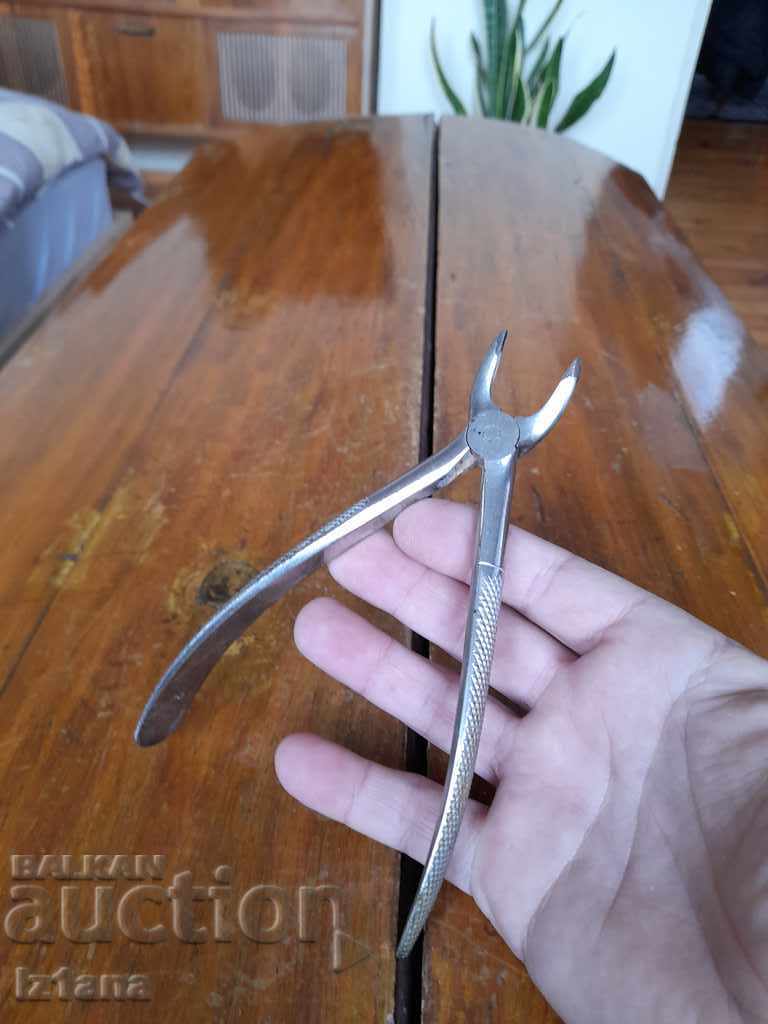 Auction  Old dental pliers