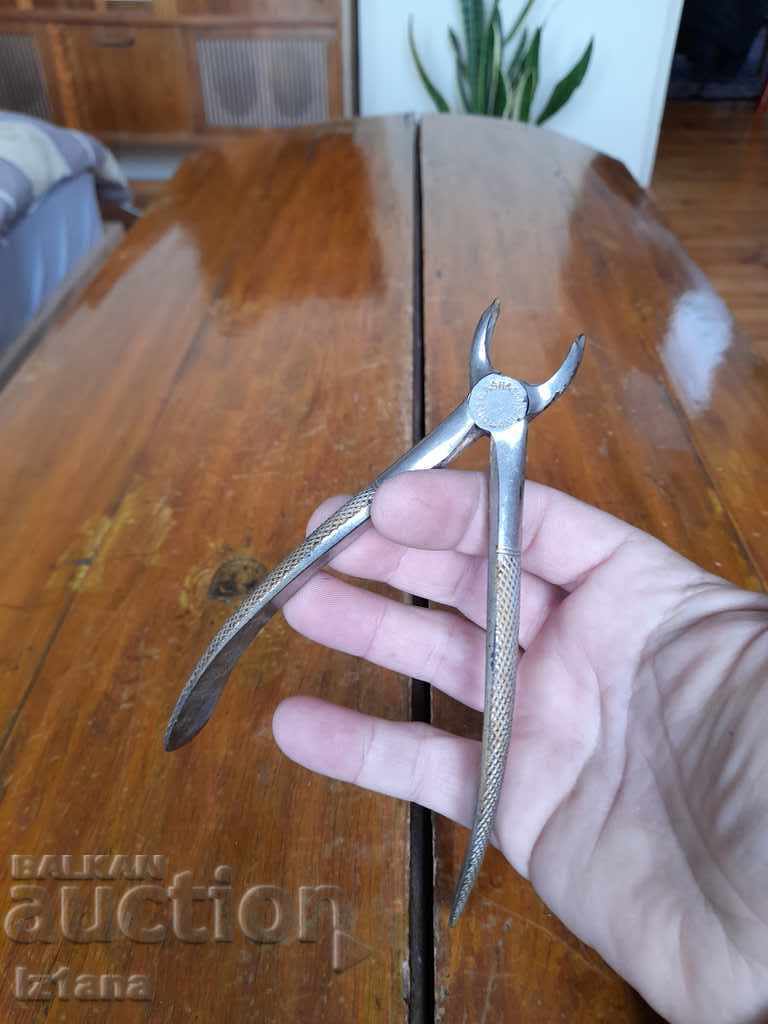 Auction  Old dental pliers C. Ash & Sons