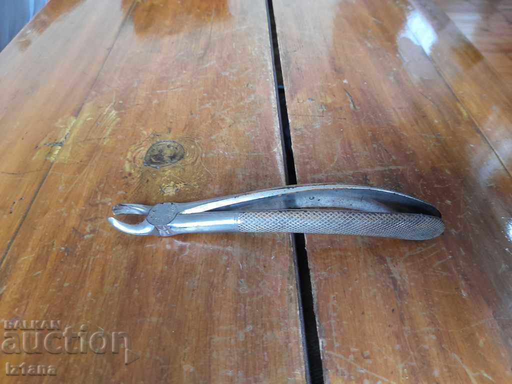 Old dental pliers C. Ash & Sons