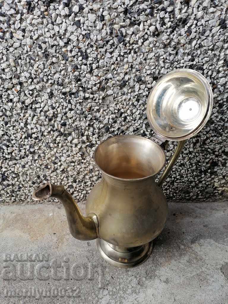 Delivery of Old brass teapot with silver-plated coffee pot jug kitchen utensils Delivery of Old brass teapot with silver-plated coffee pot jug kitchen utensils