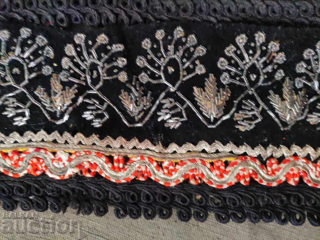 Auction part of costume, cord, silver tinsel Auction part of costume, cord, silver tinsel