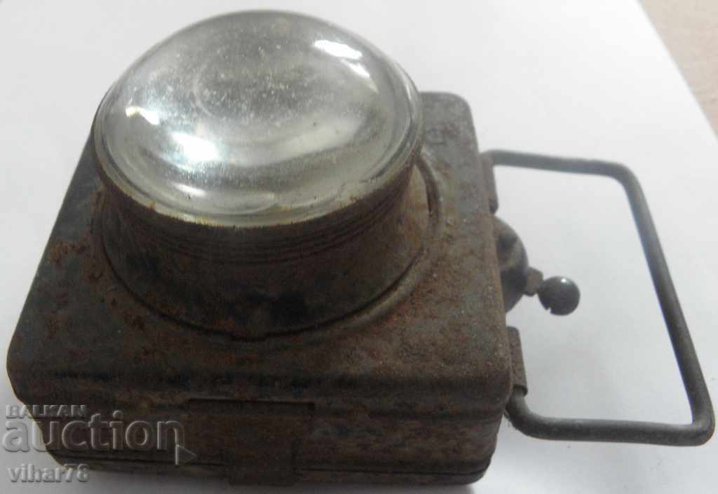 Auction  Old flashlight with magnifying glass