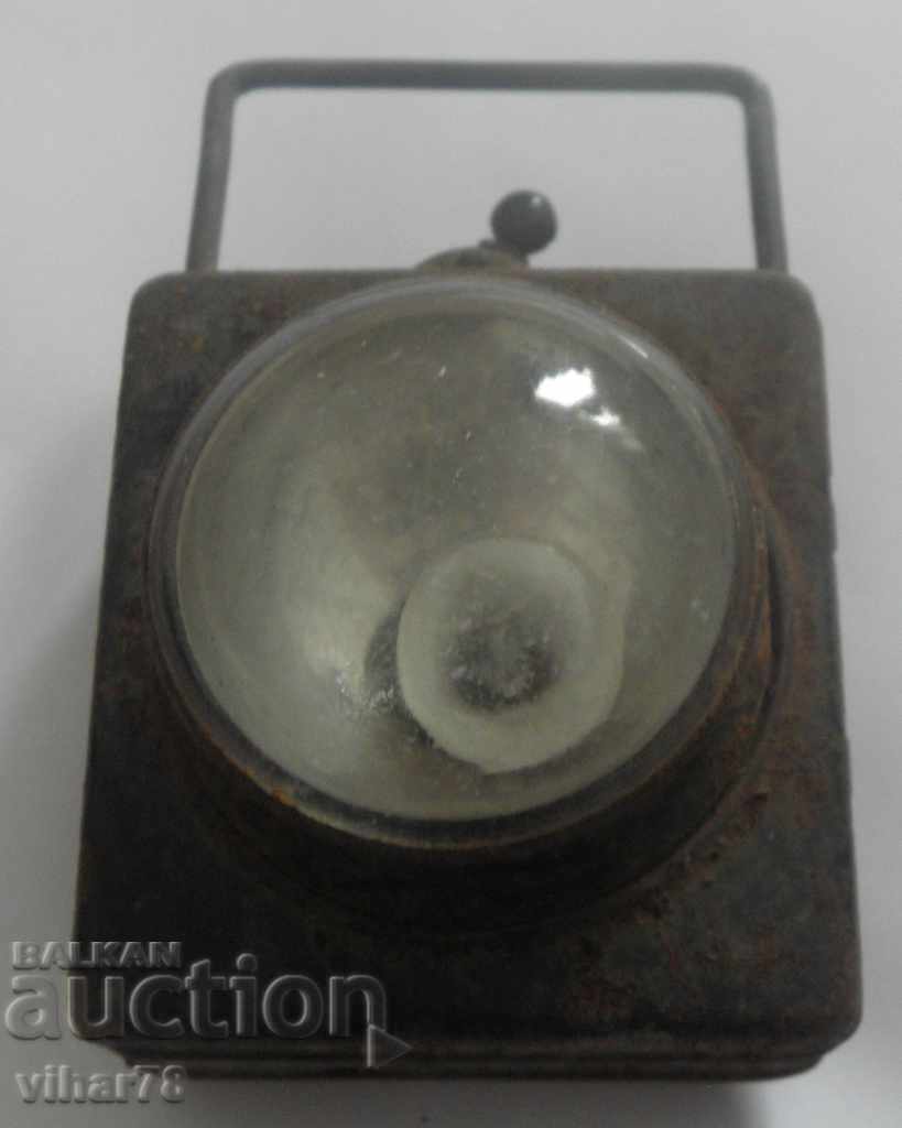 Delivery of Old flashlight with magnifying glass