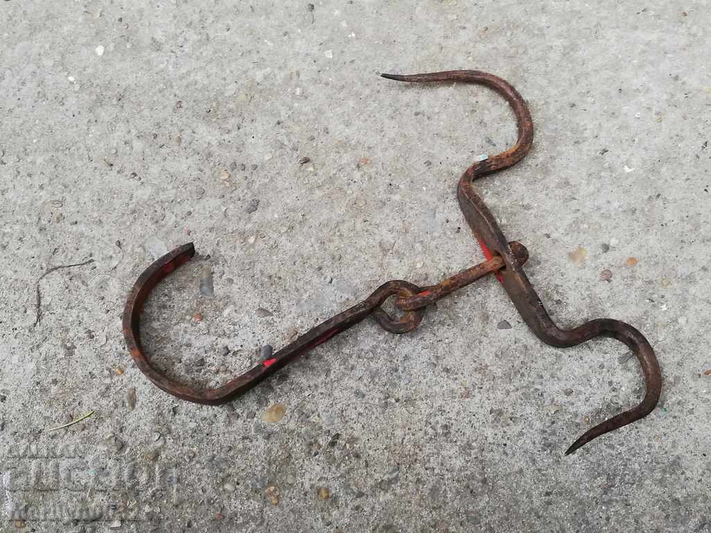 Delivery of An old forged scraping hook, double twin Delivery of An old forged scraping hook, double twin