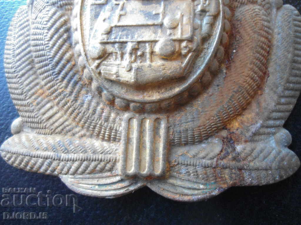 Delivery of Old metal badge from the sauce