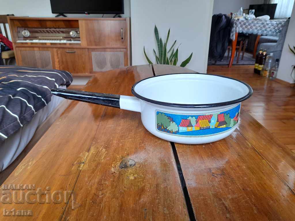 Old enameled strainer, colander