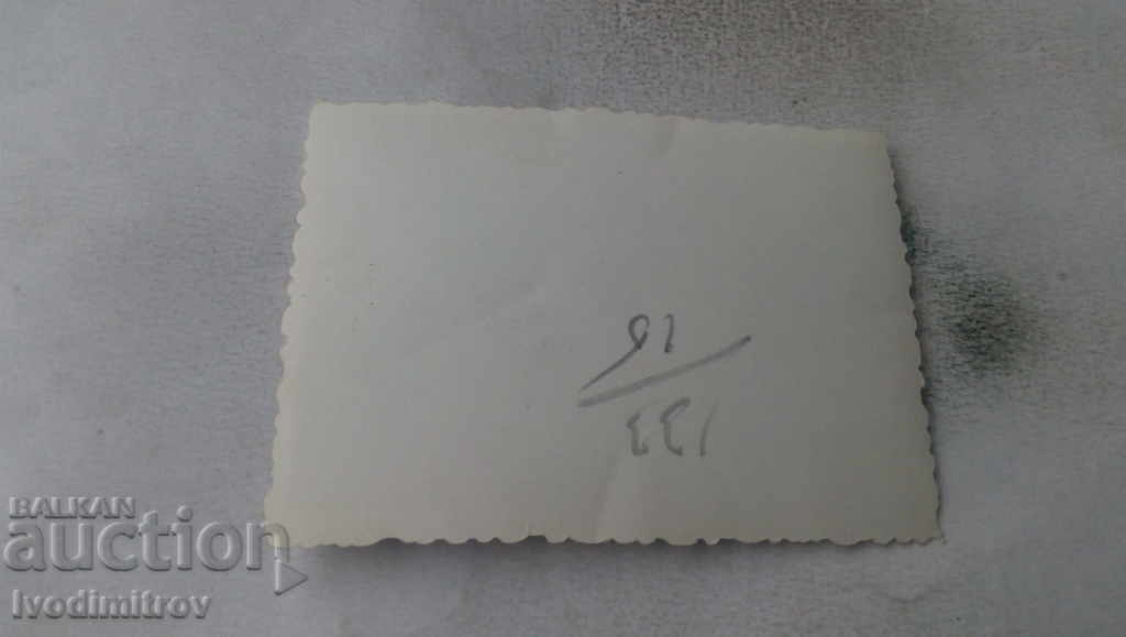 Photo Sofia Woman with damajana on a snowy street with price 1.15 BGN | € 0.59