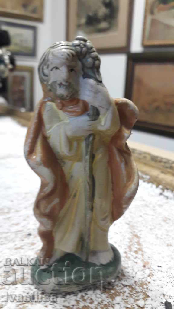 VERY OLD PORCELAIN FIGURE