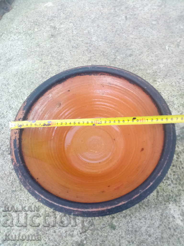 An old large ceramic bowl