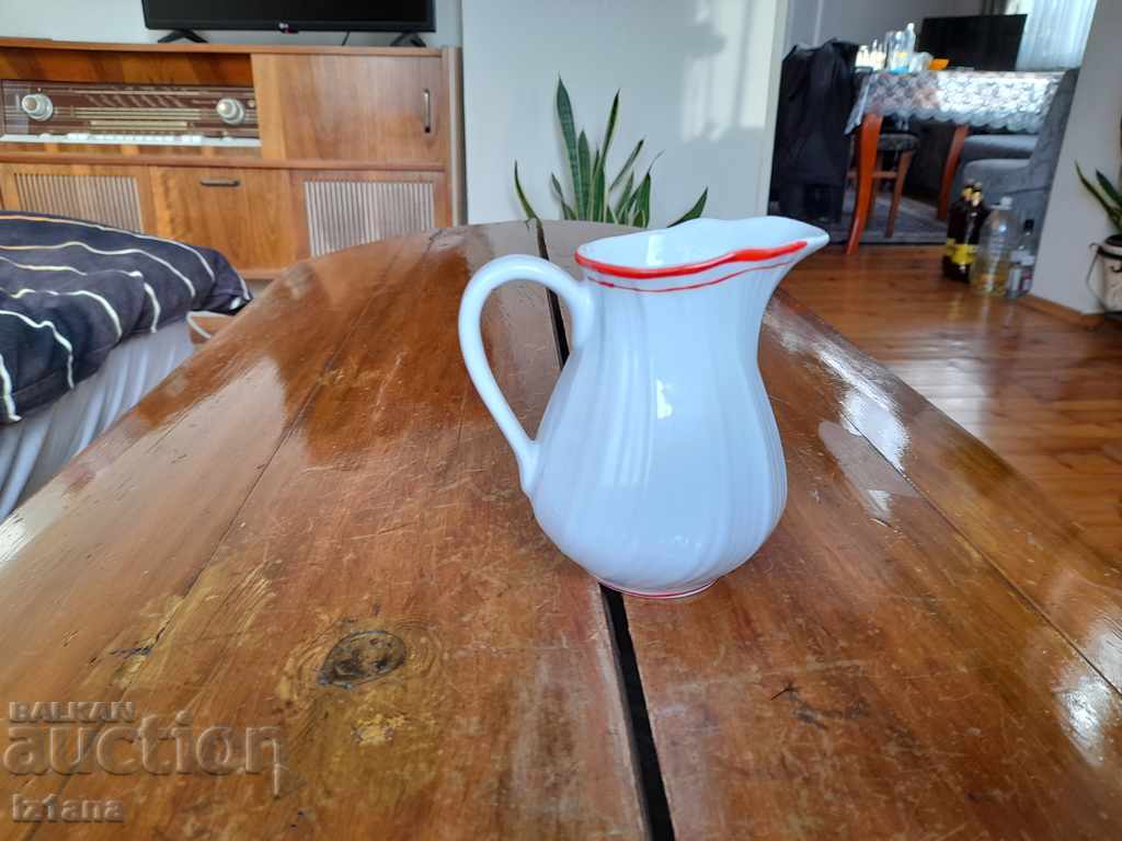 Auction An old porcelain jug, a jug Auction An old porcelain jug, a jug