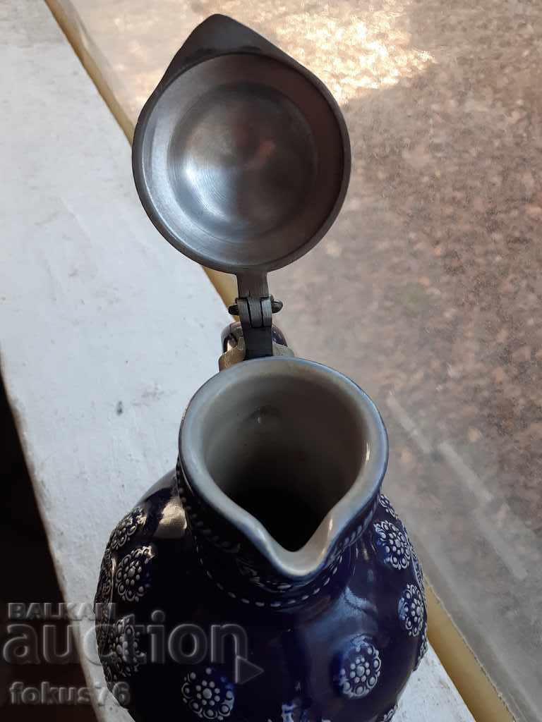 Delivery of Old German collector's wine jug with ceramic lid Delivery of Old German collector's wine jug with ceramic lid