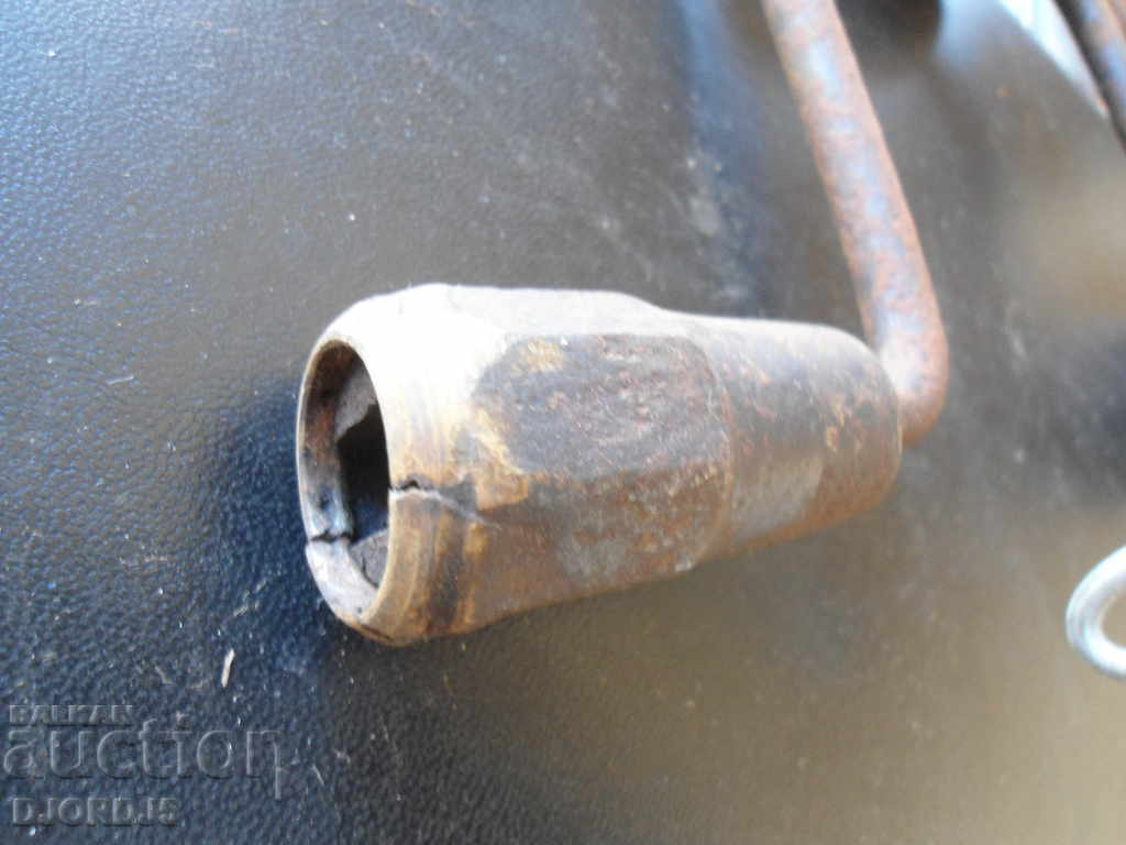 Auction An old tool, a drill, a mattock Auction An old tool, a drill, a mattock