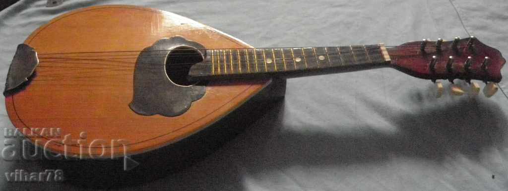 Παράδοση Ένα παλιό μαντολίνο