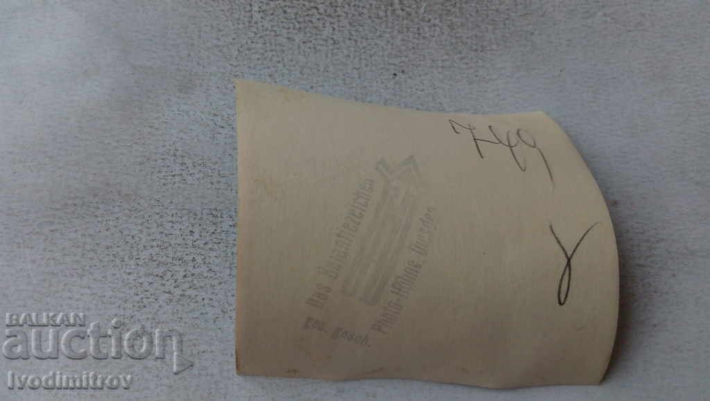 Photo Man in a swimsuit rowing a boat in the river with price 2.35 BGN | € 1.20