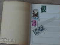 Album with old postage stamps from different countries ABRIA