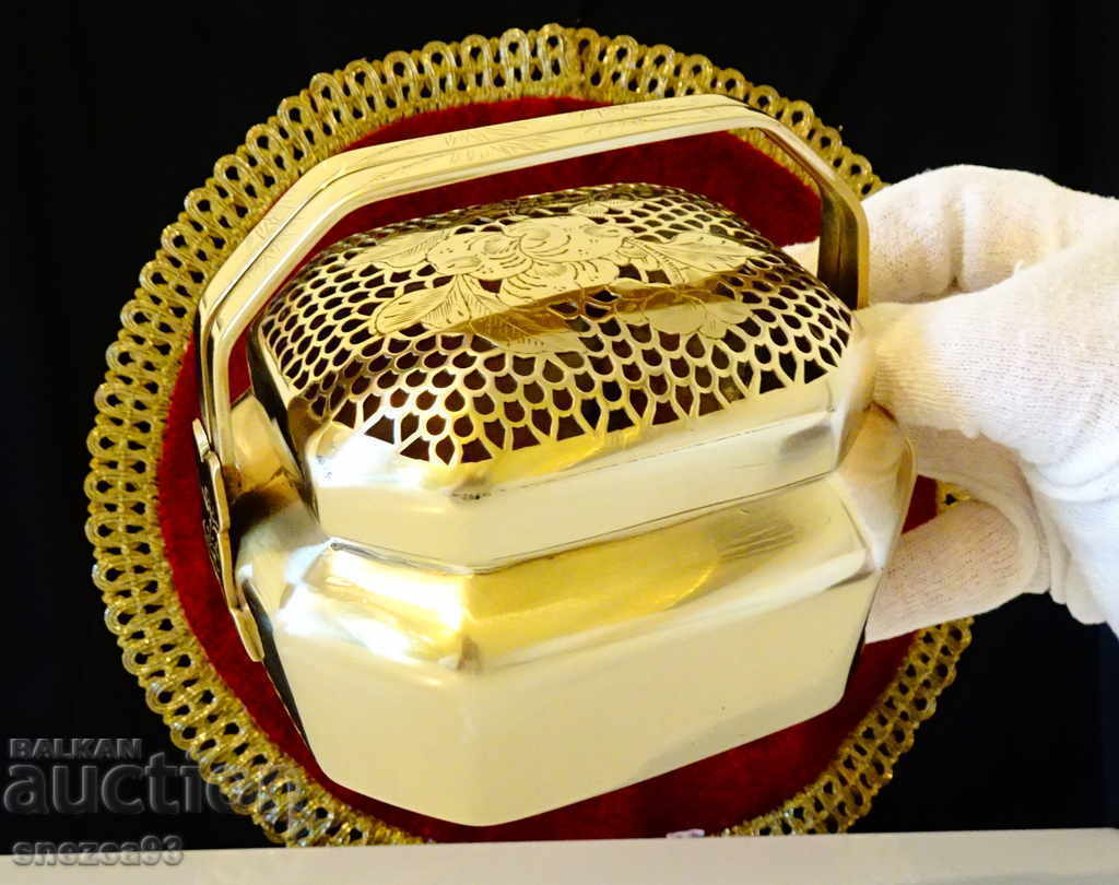 Antique bronze lamp, incense, censer, openwork, flowers. Antique bronze lamp, incense, censer, openwork, flowers.