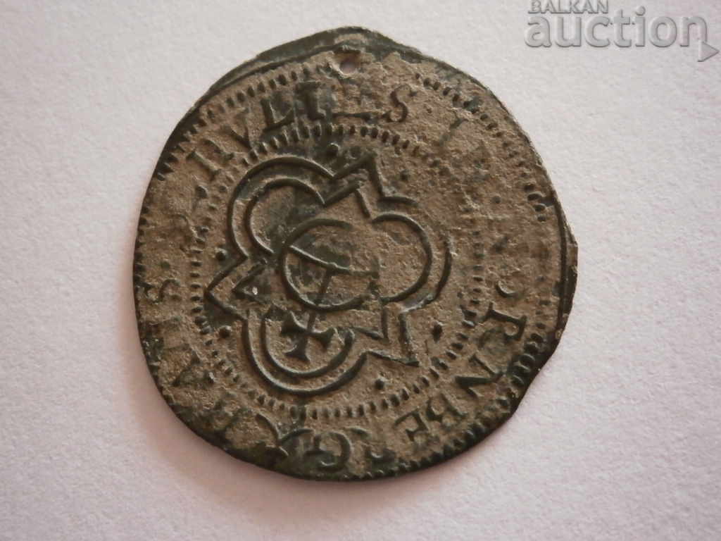 an old machine-minted European coin with a token hole - 5 an old machine-minted European coin with a token hole - 5