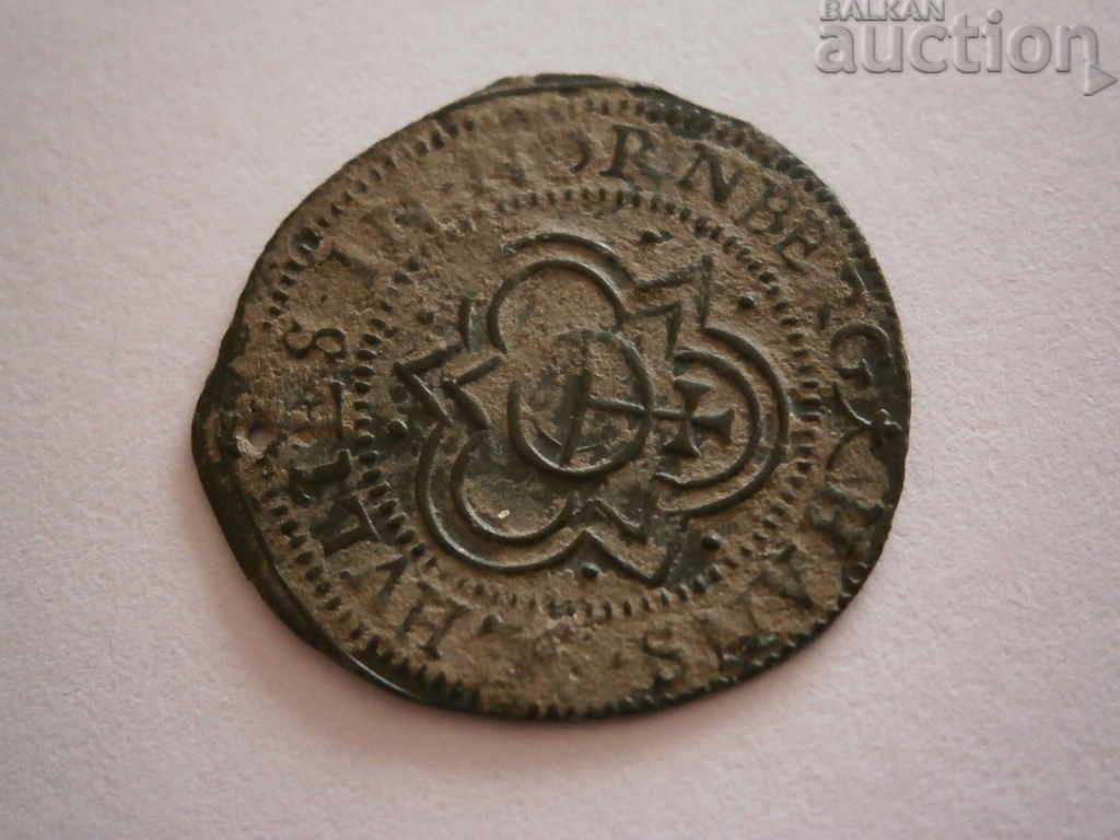 an old machine-minted European coin with a token hole - 6 an old machine-minted European coin with a token hole - 6