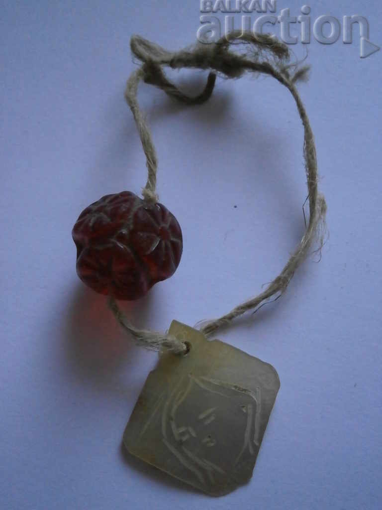 Revival mother of pearl with a red ball